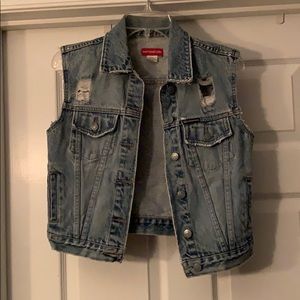 Distressed denim vest